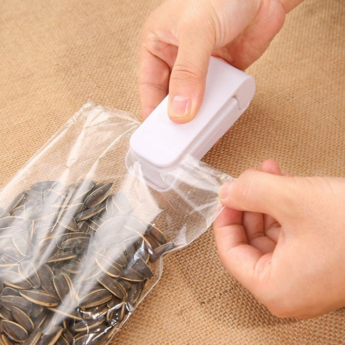 Veda Top™ — Mini Selador Elétrico Portátil para Embalagens e Sacos Plásticos